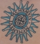 My newest addition. The celtic knot at the center is from the same page of the Book of Kells as Angel's Gryphon. The Roman Numerals are my daughter's birthdays.