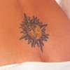 This tattoo on Charsima's lower back has never been covered on the show, so it can be considered Cordelia's tattoo as well.